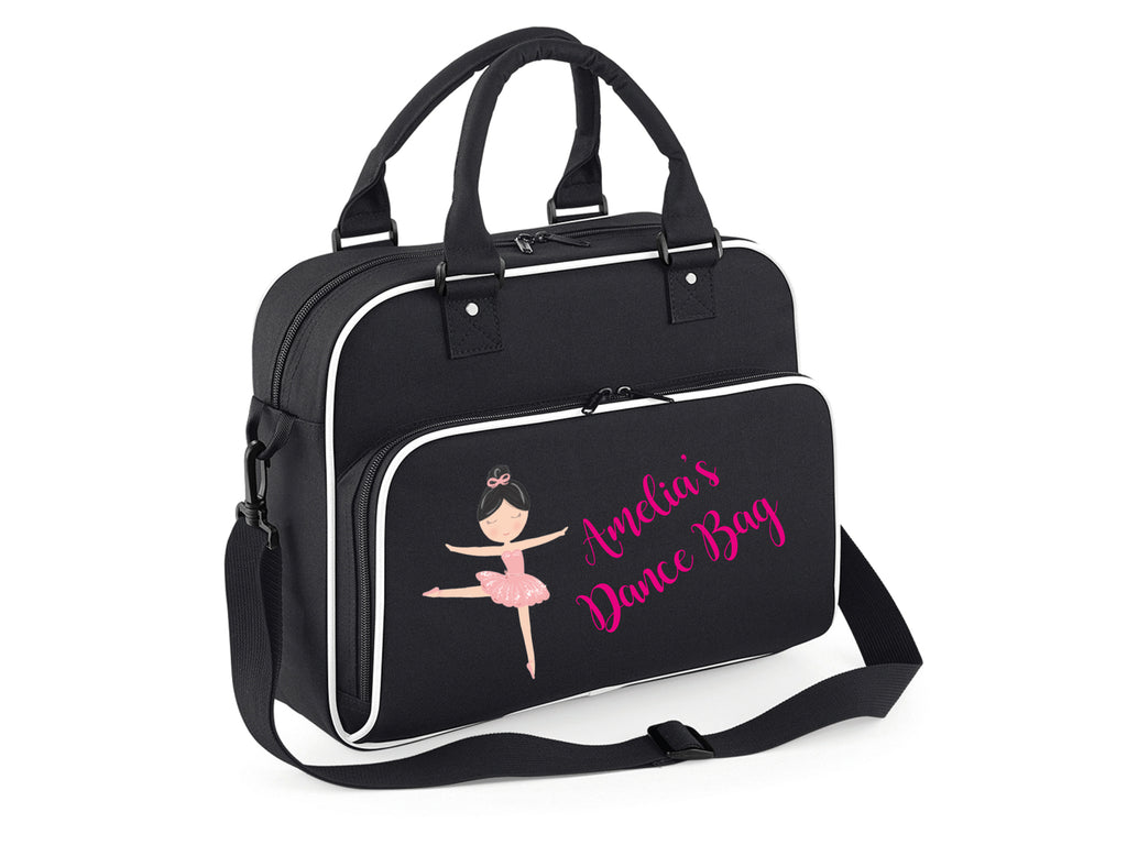 Black and white ballerina bag with a ballerina figure and name. Picture showing "Amelia's Dance Bag"