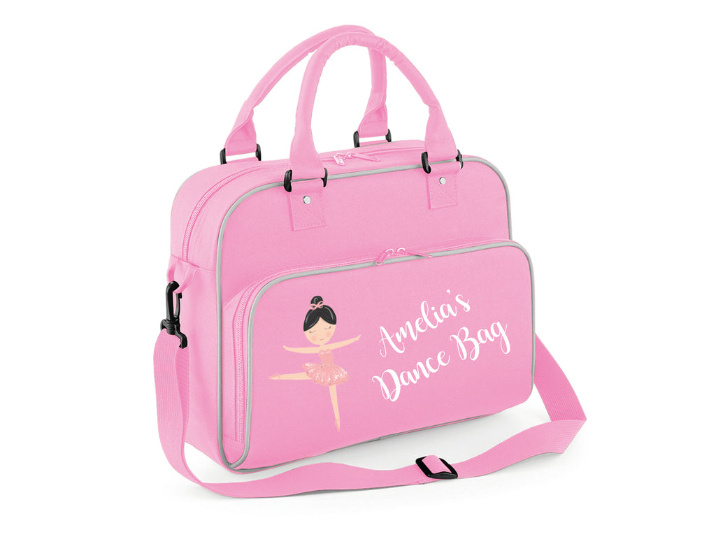 Light pink and grey ballerina bag with a ballerina figure and name. Picture showing "Amelia's Dance Bag"