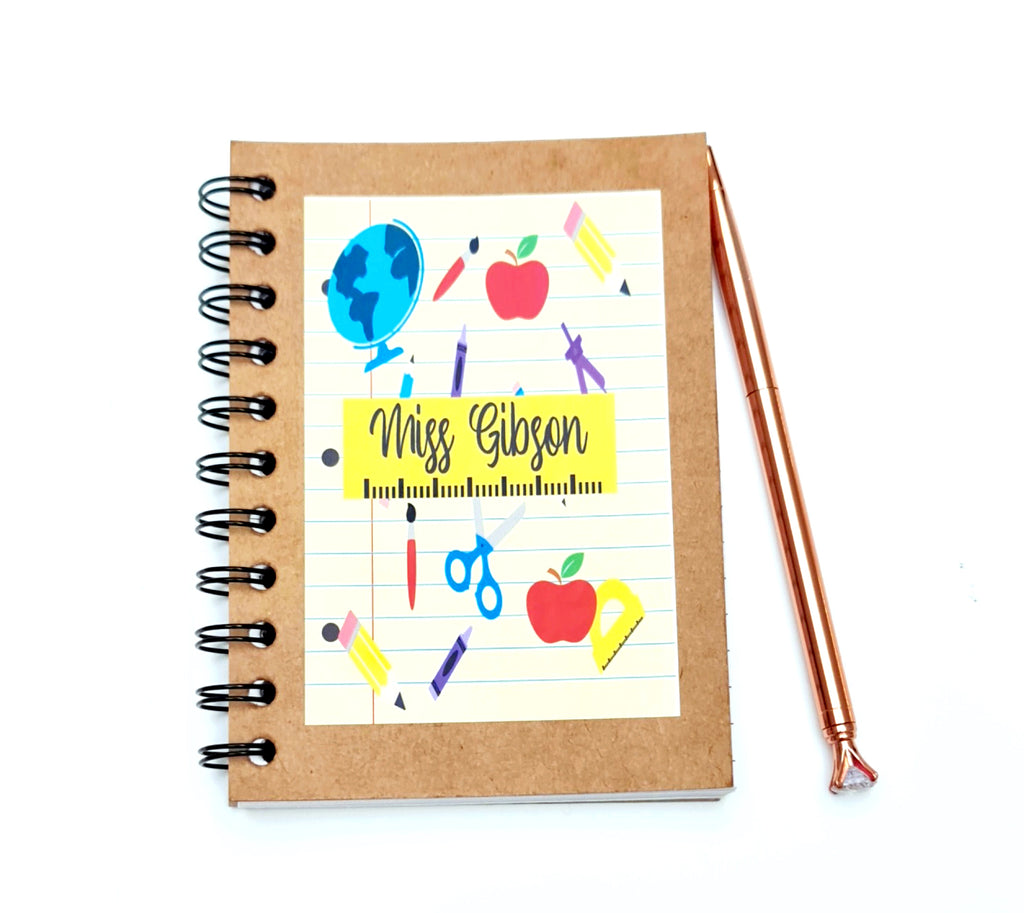 Kraft brown spiral bound A6 notebook with school supply design, personalised with name