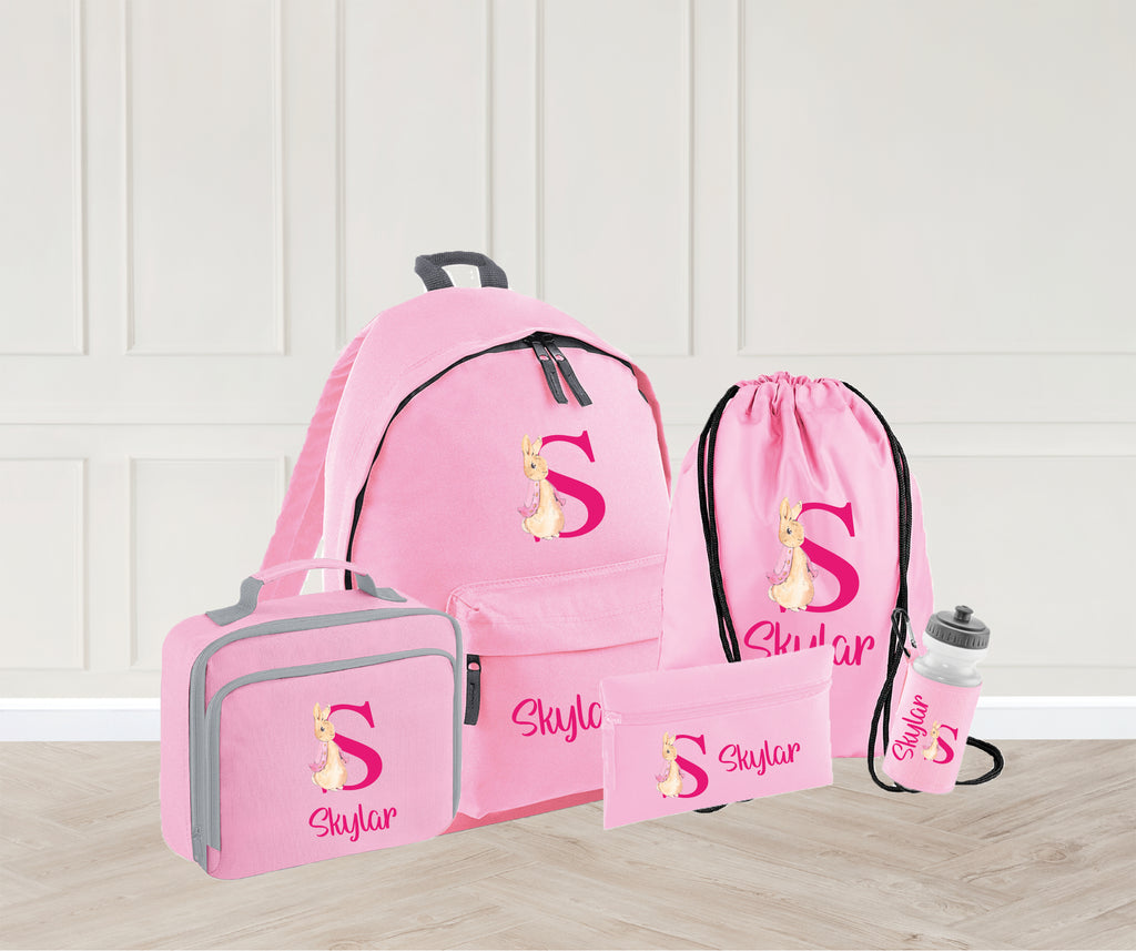 Personalised Peter Rabbit School Bag set with lunch bag, PE Bag, pencil case and water bottle. Available in 4 different colours - Light pink, Baby blue, Navy blue and Black